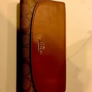 Coach Trifold wallet used.